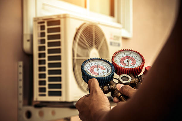 Professional Ductwork Repair technician working in Glenwood Landing, NY